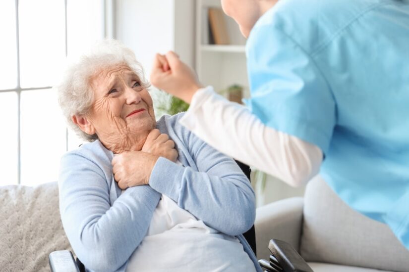 Nursing Home Worker Threatening An Elderly Woman With Her Fist